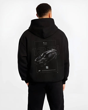 Black hoodie worn by a male model, back view, featuring BMW 750I rs turbo motorsport euro german street graphic.