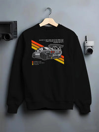 Black T-shirt laid flat with natural fabric folds, featuring Nissan 370Z turbo turbocharged racing drift jdm japanese tuner graphic.