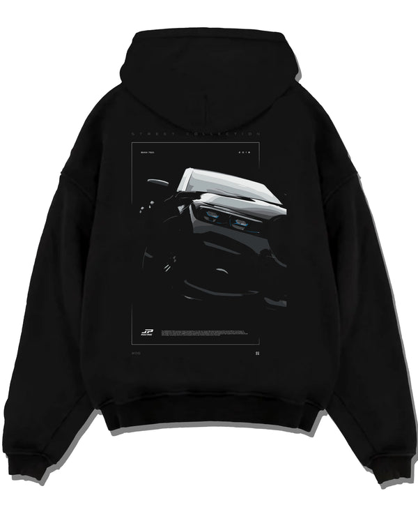 Black pullover hoodie laid flat on a white background, featuring BMW 750I rs turbo motorsport euro german street graphic.