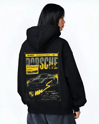 Black hoodie worn by a female model, back view, featuring Porsche 911 Turbo S rs 911 turbo racing german street classic graphic.