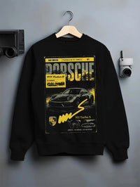 Black crewneck sweatshirt on a hanger against a grey wall, featuring Porsche 911 Turbo S rs 911 turbo racing german street graphic.