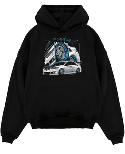 Black pullover hoodie laid flat on a white background, featuring ACURA jdm tuning stance slammed bagged street enthusiast graphic.