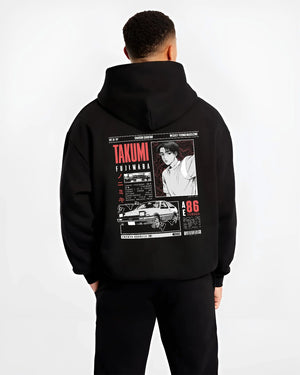 Black hoodie worn by a male model, back view, featuring AE86 racing drift japanese initial d street retro performance graphic.