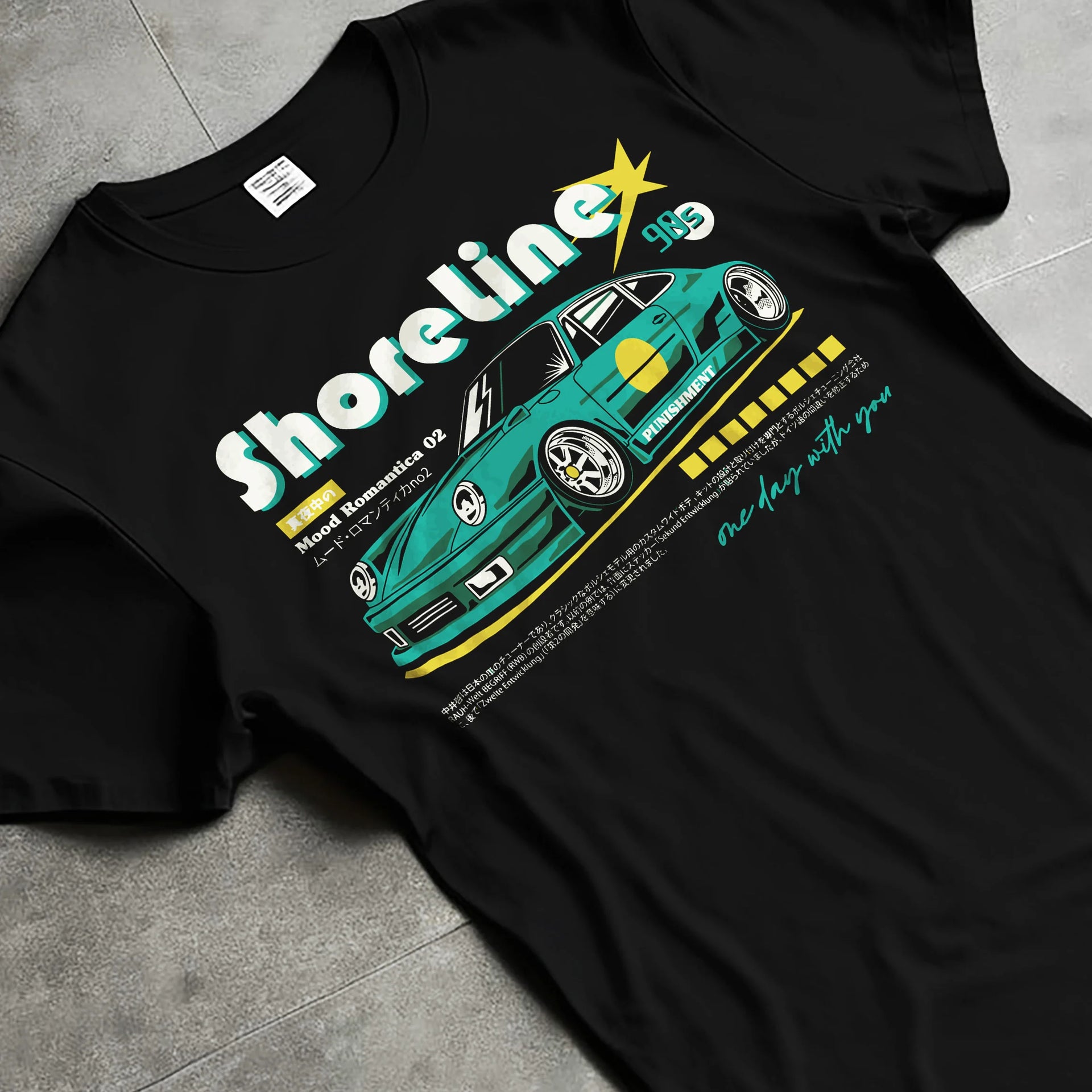 Black T-shirt laid flat with natural fabric folds, featuring Porsche 911 rs race japanese stance widebody street retro graphic.