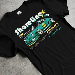 Black T-shirt laid flat with natural fabric folds, featuring Porsche 911 rs race japanese stance widebody street retro graphic.