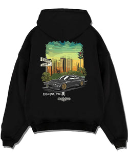 Black pullover hoodie laid flat on a white background, featuring Dodge Charger skyline american muscle street classic graphic.