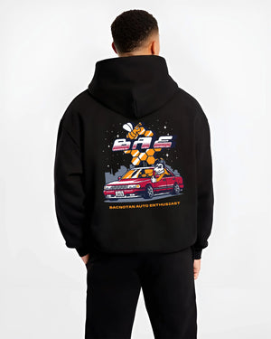 Black hoodie worn by a male model, back view, featuring street retro enthusiast racing performance motorsport automotive graphic.