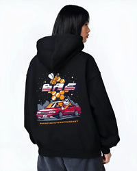 Black hoodie worn by a female model, back view, featuring street retro enthusiast racing performance motorsport automotive graphic.