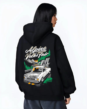 Black hoodie worn by a female model, back view, featuring Volkswagen street retro racing performance motorsport automotive graphic.