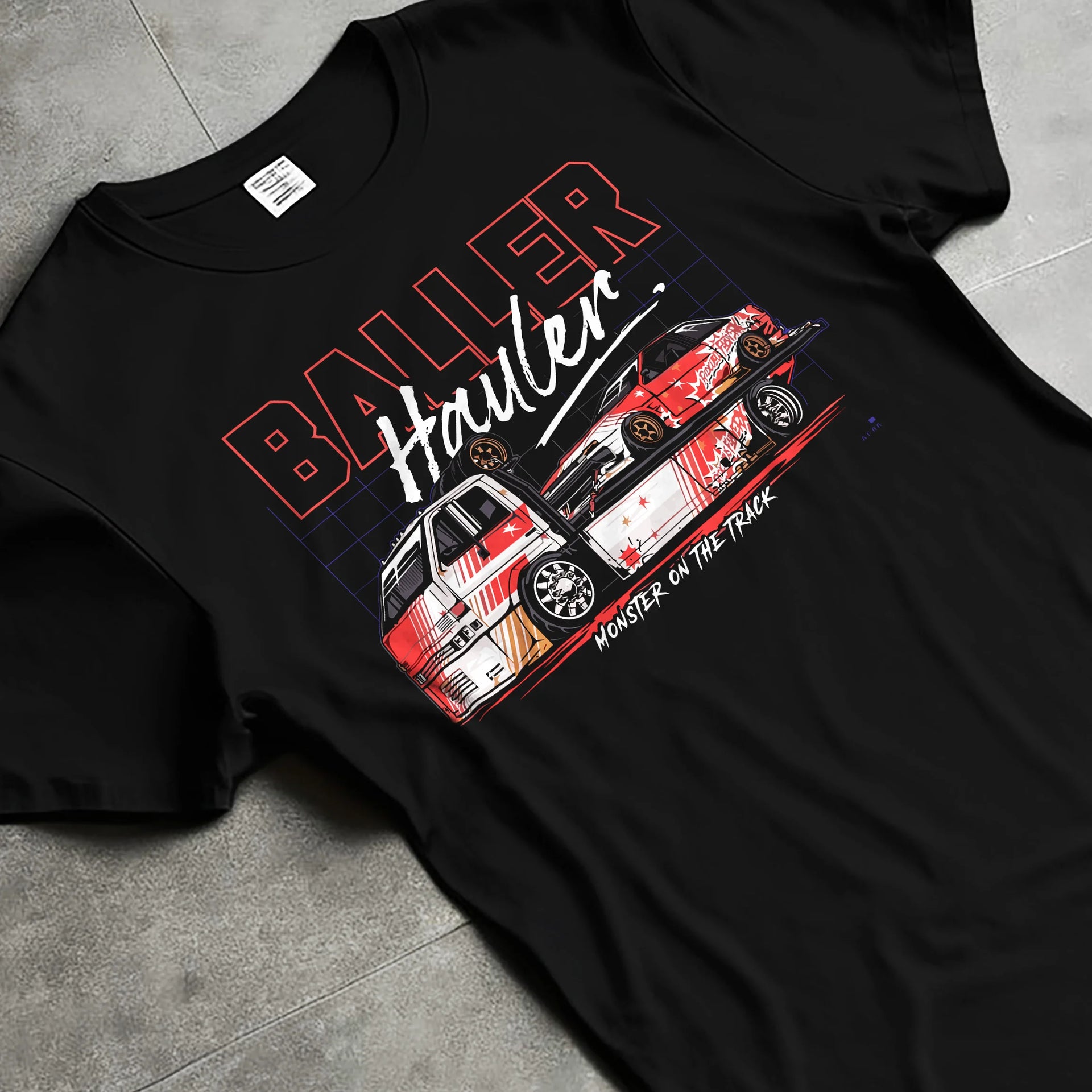 Black T-shirt laid flat with natural fabric folds, featuring racing drift japanese tuner street performance motorsport graphic.