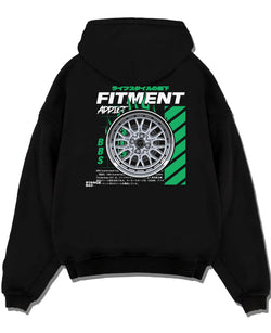 Black pullover hoodie laid flat on a white background, featuring racing jdm stance street performance motorsport automotive graphic.