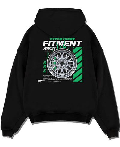 Black pullover hoodie laid flat on a white background, featuring racing jdm stance street performance motorsport automotive graphic.