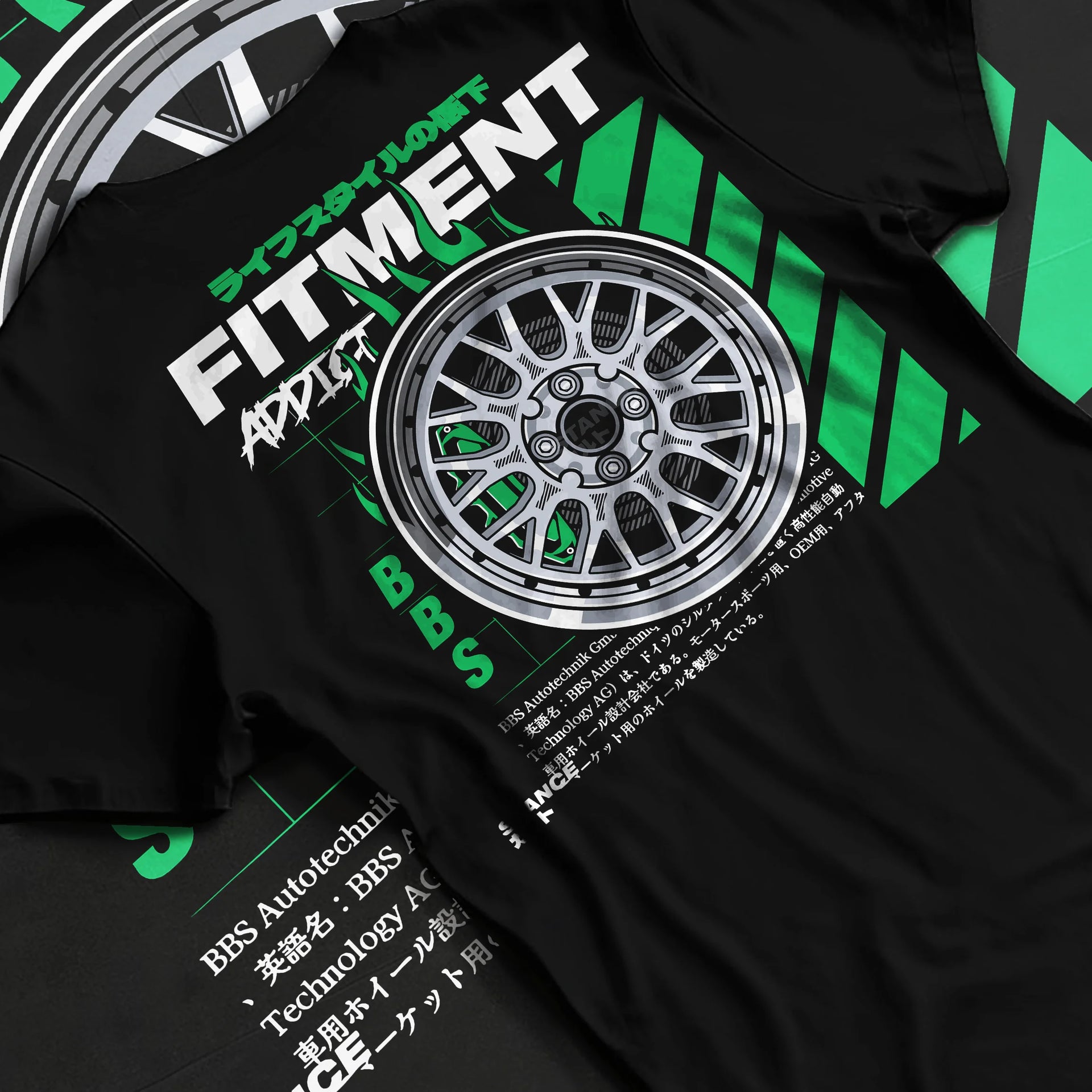 Black T-shirt laid flat with natural fabric folds, featuring racing jdm stance street performance motorsport automotive graphic.