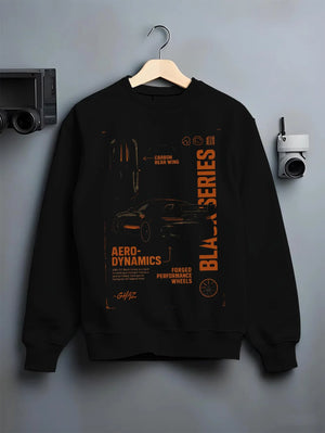 Black crewneck sweatshirt on a hanger against a grey wall, featuring Mercedes-Benz AMG rs racing motorsport street blkamg.
