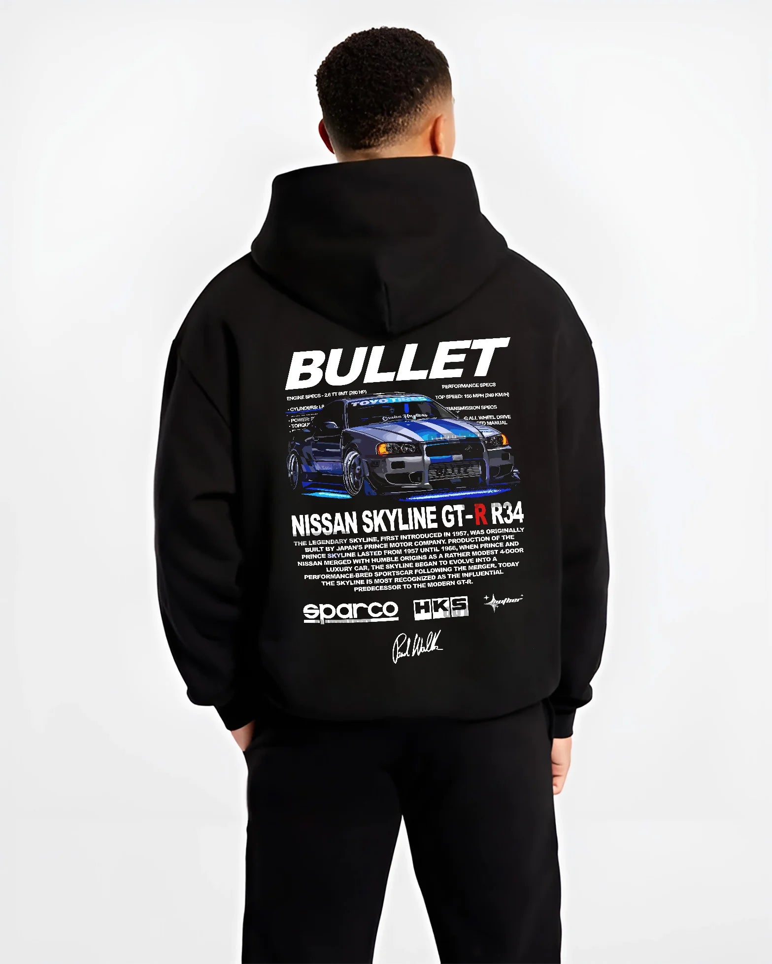 Black hoodie worn by a male model, back view, featuring Nissan Skyline R34 gt r r34 skyline racing drift jdm street graphic.