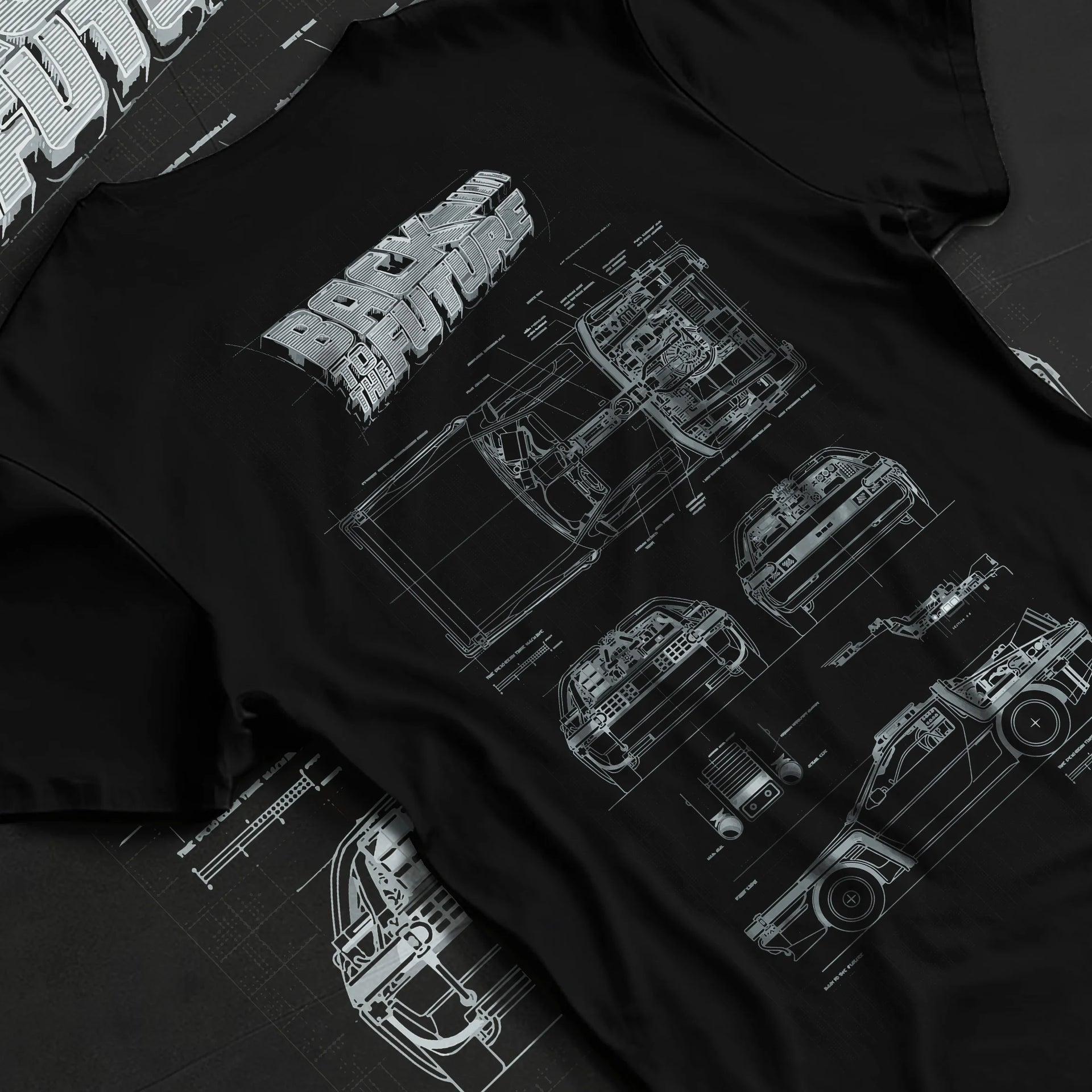 Black T-shirt laid flat with natural fabric folds, featuring DeLorean DMC-12 street retro racing performance motorsport graphic.