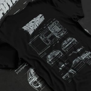 Black T-shirt laid flat with natural fabric folds, featuring DeLorean DMC-12 street retro racing performance motorsport graphic.