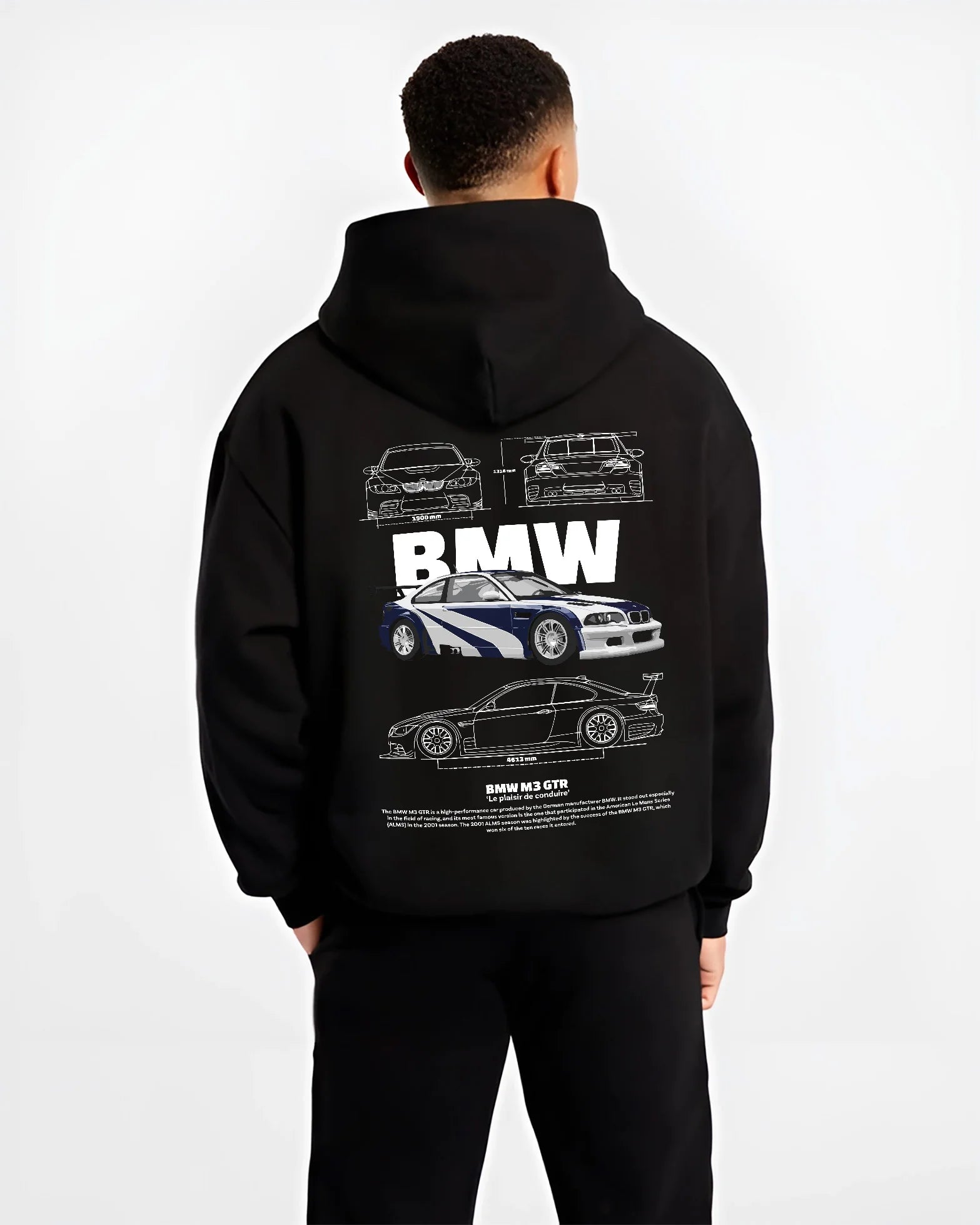 Black hoodie worn by a male model, back view, featuring BMW racing drift german tuner enthusiast street performance graphic.