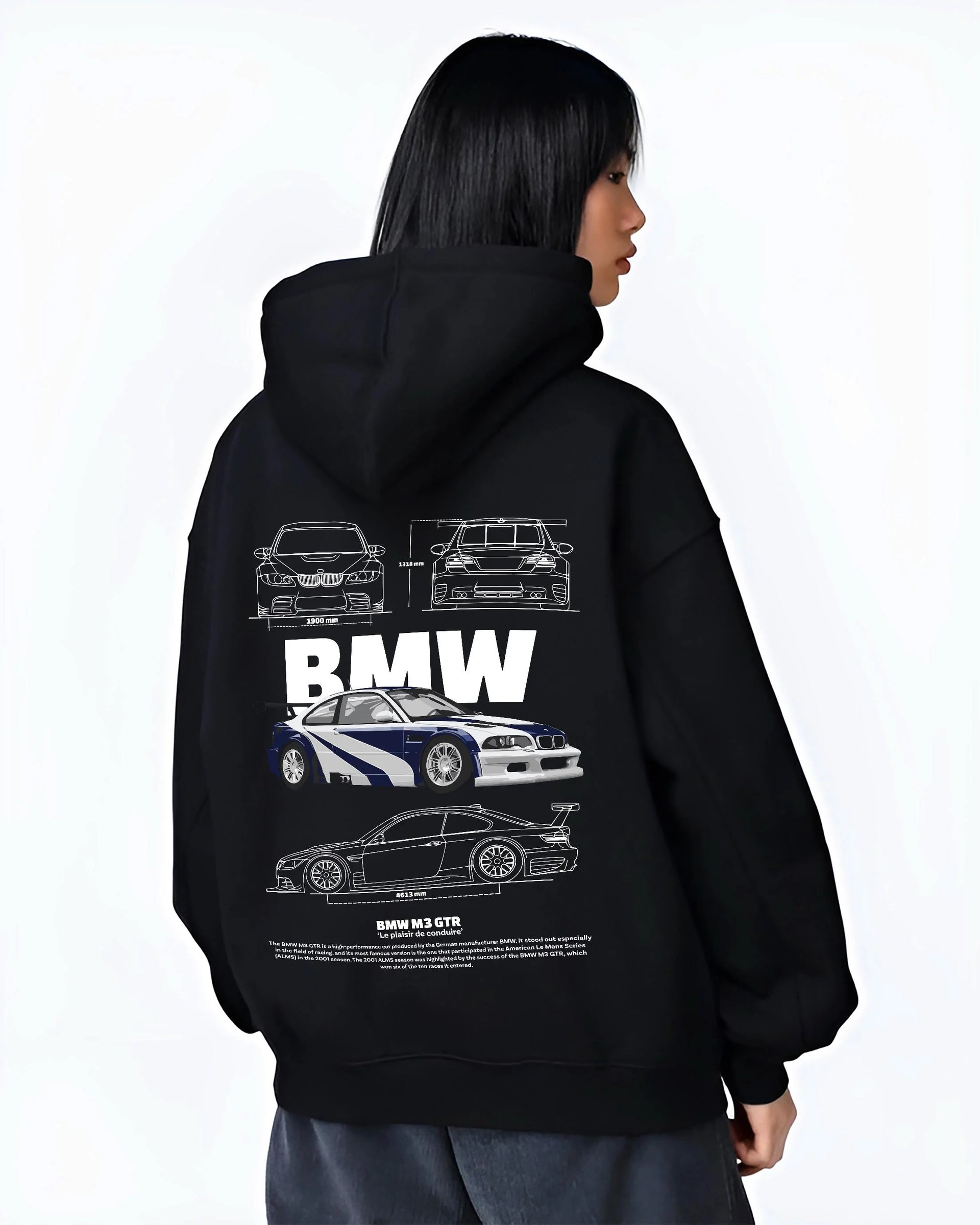 Black hoodie worn by a female model, back view, featuring BMW racing drift german tuner enthusiast street performance graphic.