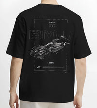 Black T-shirt worn by a male model, back view, featuring BMW 202 rs racing le mans motorsport german street graphic.
