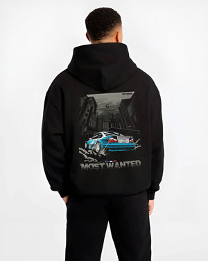 Black hoodie worn by a male model, back view, featuring BMW M3 gtr drift need for speed legend speed racing graphic.