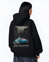 Black hoodie worn by a female model, back view, featuring BMW M3 gtr drift need for speed legend speed racing graphic.