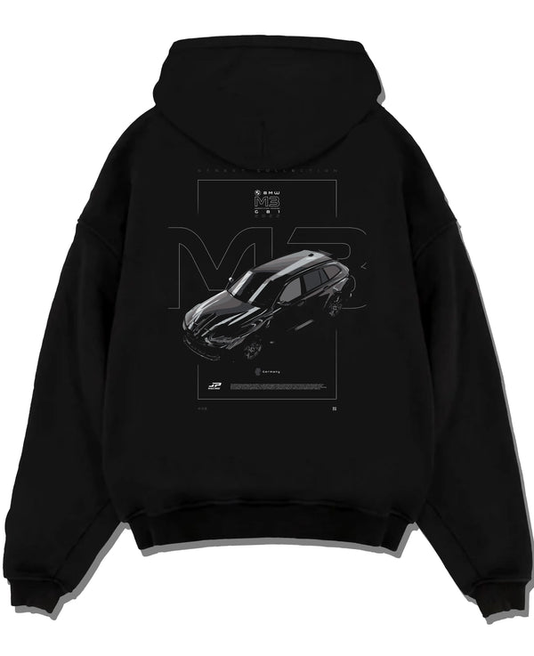 Black pullover hoodie laid flat on a white background, featuring BMW M3 street racing performance motorsport automotive graphic.
