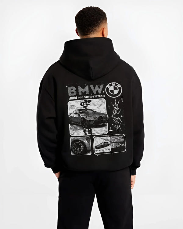 Black hoodie worn by a male model, back view, featuring BMW M4 german racing street performance motorsport automotive graphic.