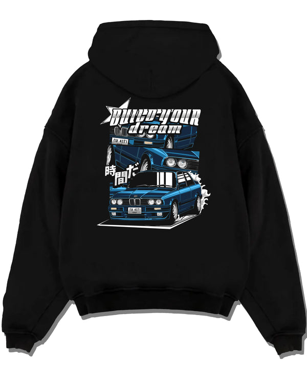 Black pullover hoodie laid flat on a white background, featuring BMW E30 jdm japanese retro classic enthusiast racing graphic.