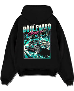 Black pullover hoodie laid flat on a white background, featuring street racing performance motorsport automotive enthusiast graphic.