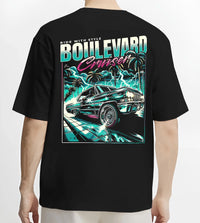 Black T-shirt worn by a male model, back view, featuring street racing performance motorsport automotive enthusiast power graphic.