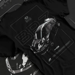 Black T-shirt laid flat with natural fabric folds, featuring Subaru BRZ rs racing drift formula motorsport jdm street graphic.