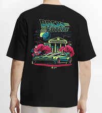 Black T-shirt worn by a male model, back view, featuring DeLorean DMC-12 street retro classic racing performance motorsport graphic.