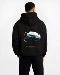 Black hoodie worn by a male model, back view, featuring Bugatti racing speed street performance motorsport automotive graphic.