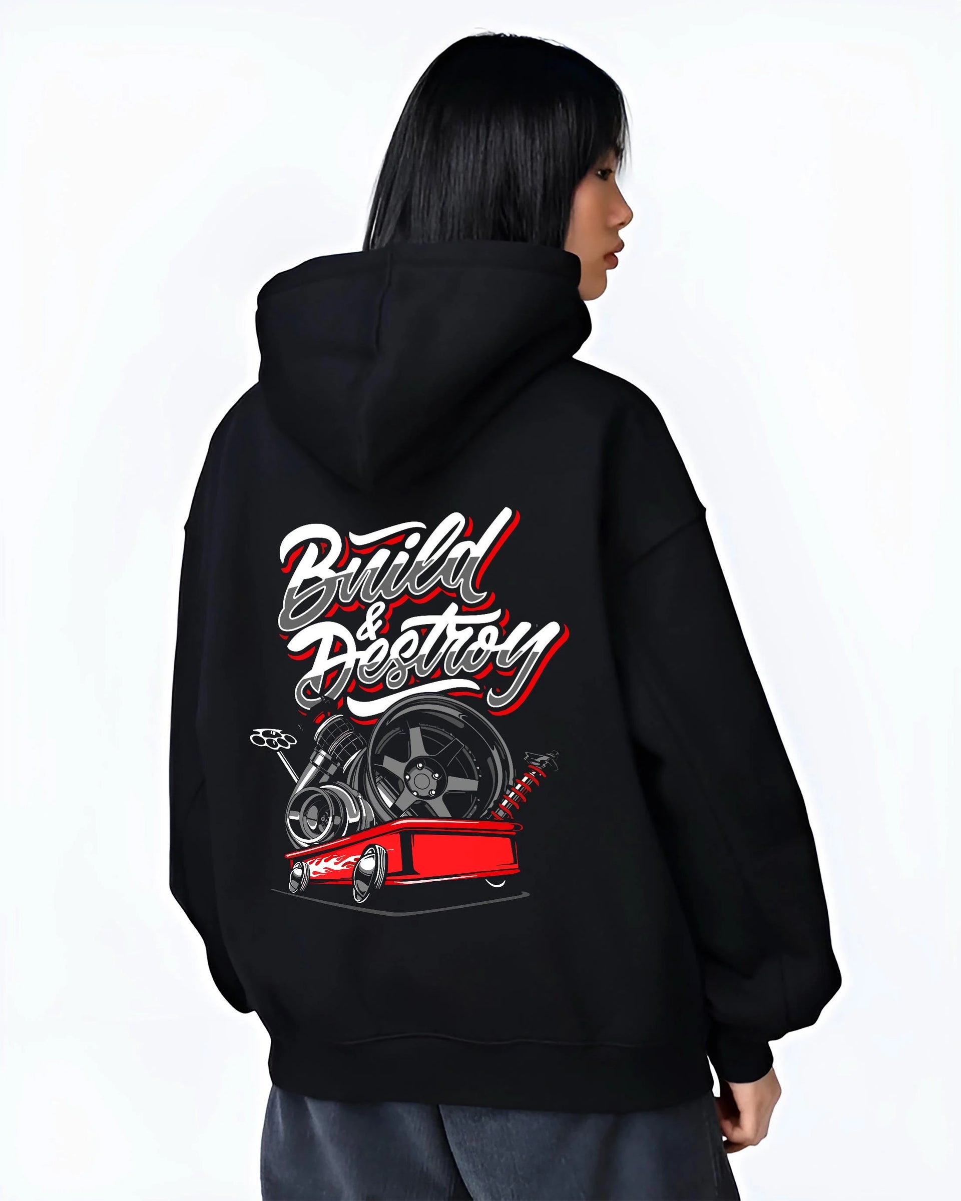 Black hoodie worn by a female model, back view, featuring racing street performance motorsport automotive enthusiast power graphic.