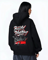 Black hoodie worn by a female model, back view, featuring racing street performance motorsport automotive enthusiast power graphic.