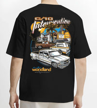 Black T-shirt worn by a male model, back view, featuring Chevrolet C10 retro vintage classic racing street performance graphic.