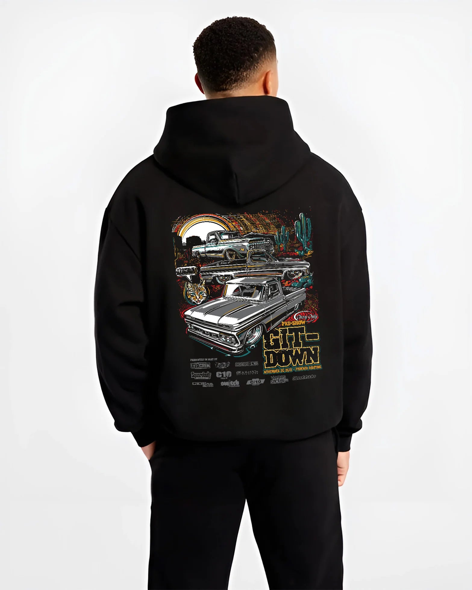 Black hoodie worn by a male model, back view, featuring Chevrolet Corvette C8R gt3 rs corvette racing motorsport american graphic.