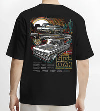 Black T-shirt worn by a male model, back view, featuring Chevrolet Corvette C8R gt3 rs corvette racing motorsport american graphic.