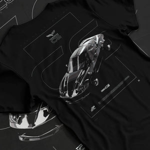 Black T-shirt laid flat with natural fabric folds, featuring Chevrolet Corvette C8R rs corvette racing motorsport american graphic.