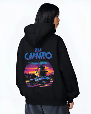 Black hoodie worn by a female model, back view, featuring Chevrolet Camaro rs racing nascar motorsport american muscle graphic.