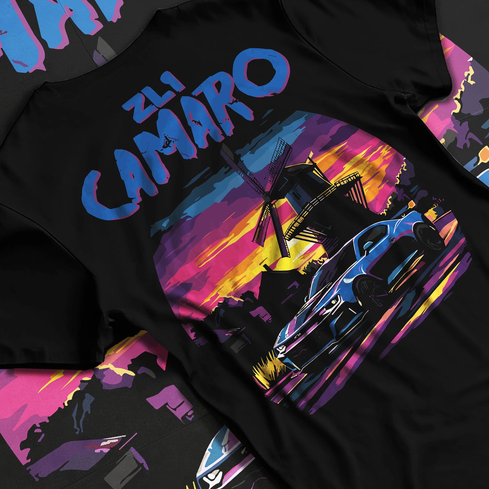 Black T-shirt laid flat with natural fabric folds, featuring Chevrolet Camaro rs racing nascar motorsport american muscle graphic.