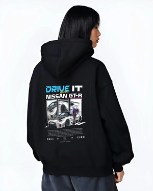 Black hoodie worn by a female model, back view, featuring muscle retro vintage classic enthusiast racing street performance graphic.