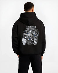 Black hoodie worn by a male model, back view, featuring turbo tuner street vintage enthusiast racing performance motorsport graphic.