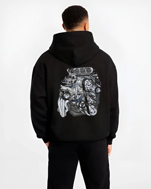 Black hoodie worn by a male model, back view, featuring turbo tuner street vintage enthusiast racing performance motorsport graphic.
