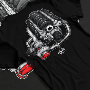 Black T-shirt laid flat with natural fabric folds, featuring supercharged v8 muscle street retro power enthusiast racing graphic.
