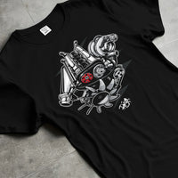 Black T-shirt laid flat with natural fabric folds, featuring muscle retro vintage racing street performance motorsport graphic.