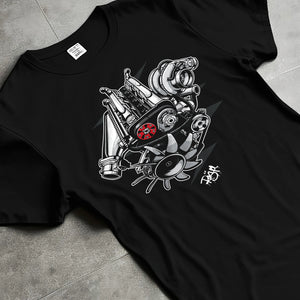 Black T-shirt laid flat with natural fabric folds, featuring muscle retro vintage racing street performance motorsport graphic.