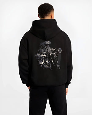 Black hoodie worn by a male model, back view, featuring street enthusiast racing performance motorsport automotive power graphic.