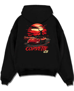 Black pullover hoodie laid flat on a white background, featuring Chevrolet Camaro racing drag american muscle street retro graphic.